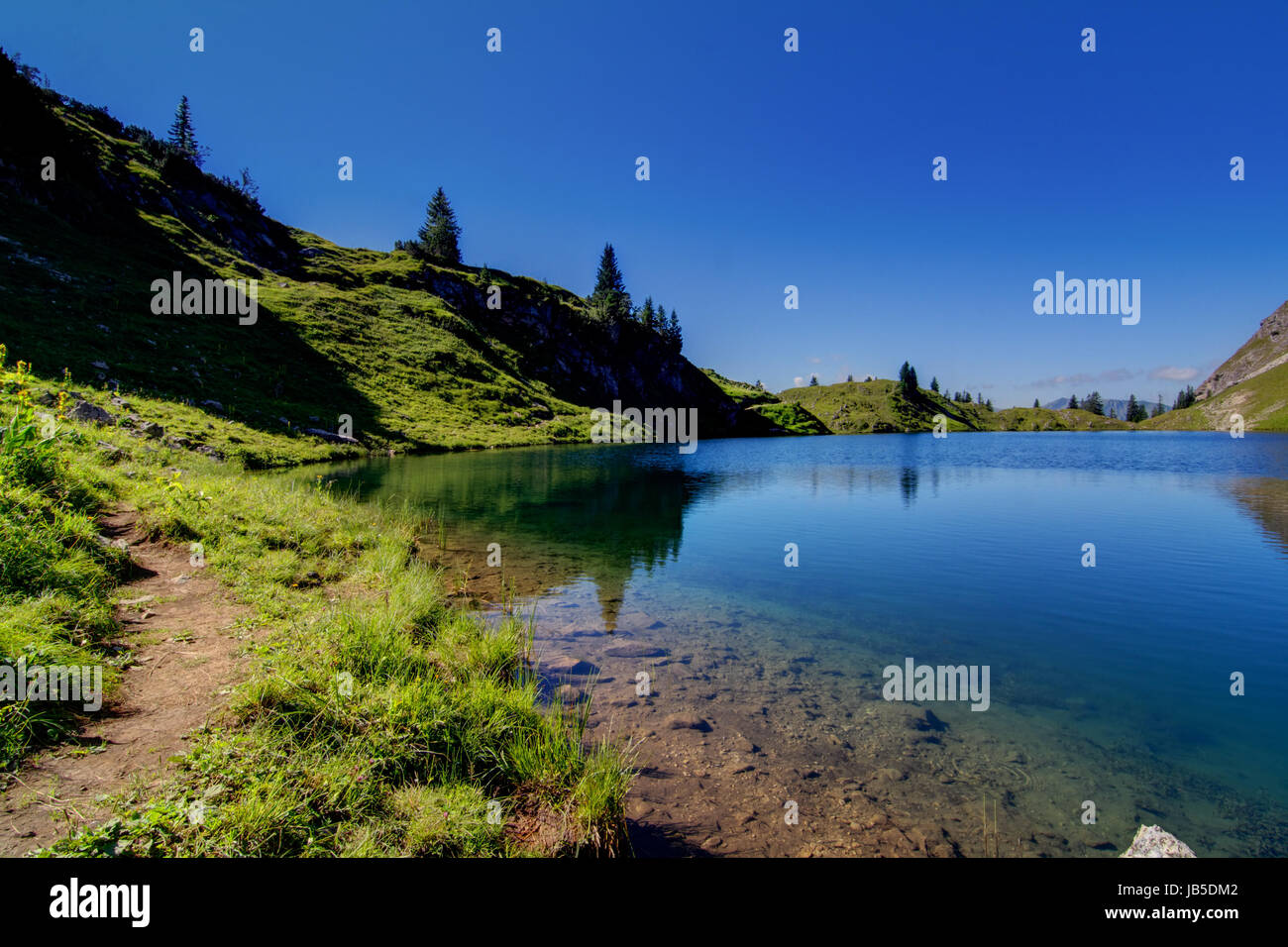 alpine lake in the high mountains Stock Photo