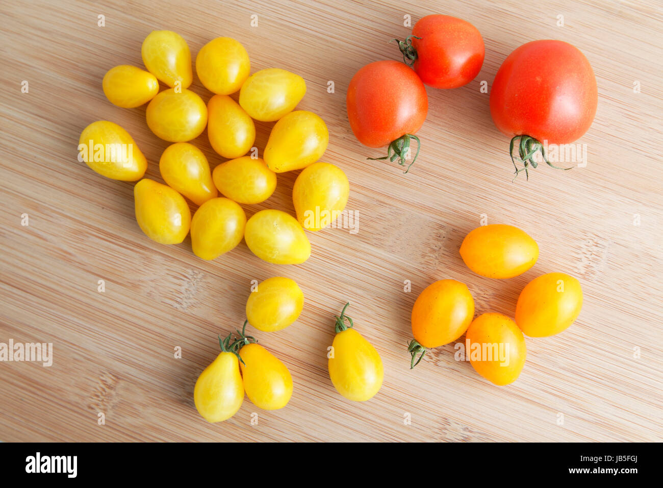 tomatoes on the cutting board Stock Photo
