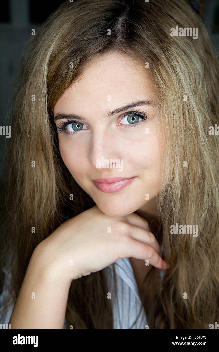 Front view of attractive blonde woman looking into the camera Stock Photo