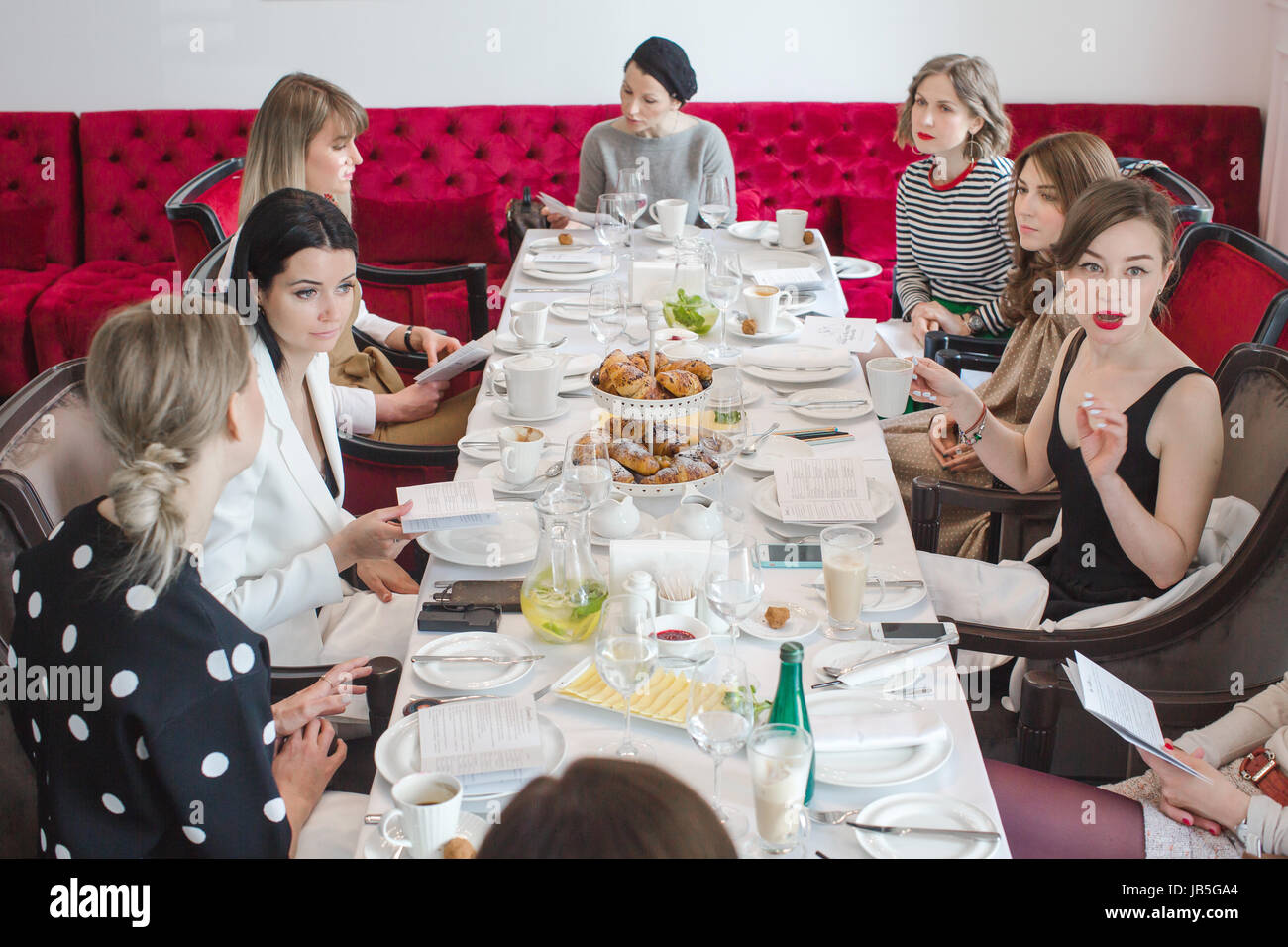 Women having meeting French lesson for adults. Stock Photo