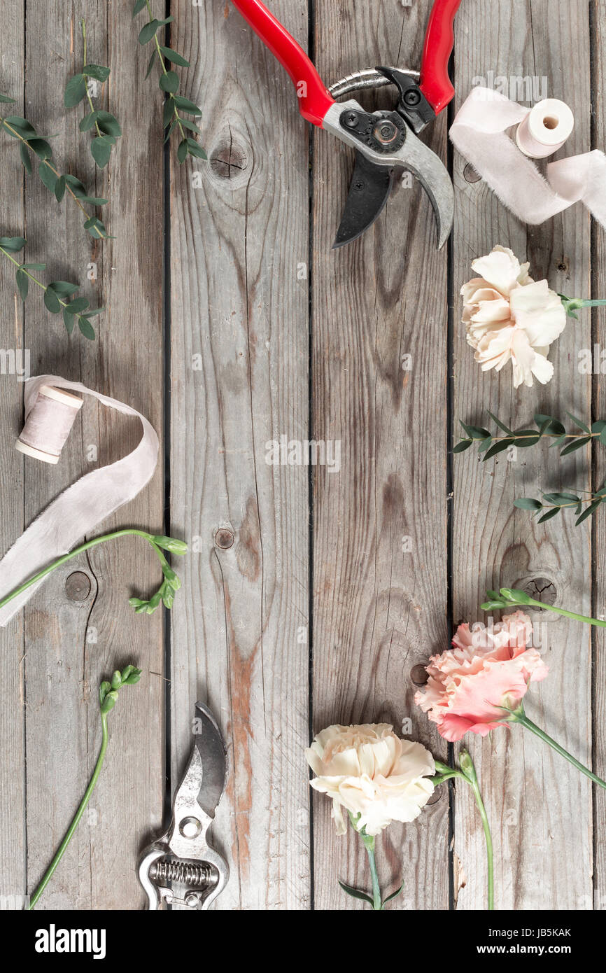 flowers and garden tools. The florist work table with accessories