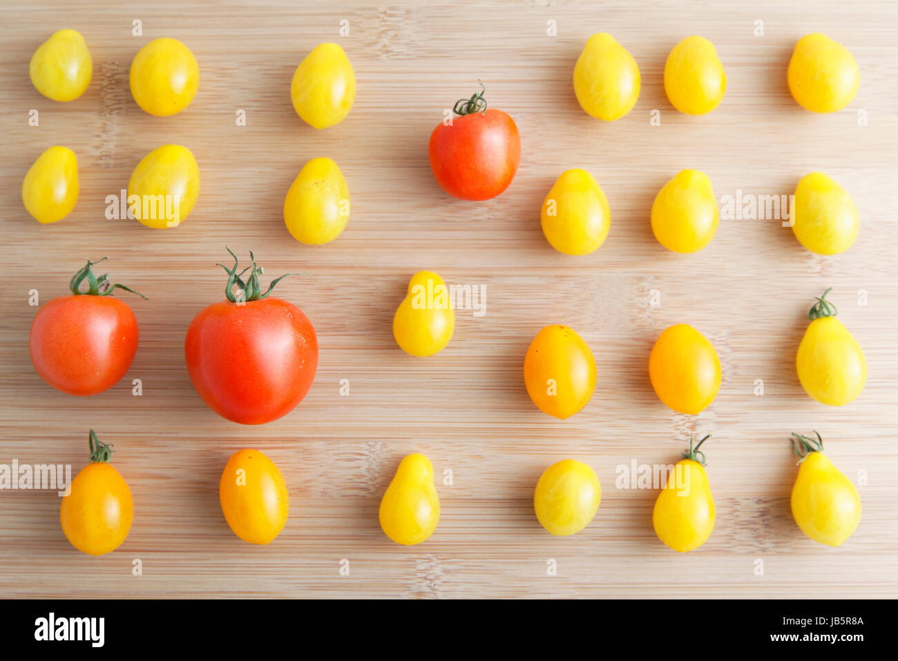 tomatoes on the cutting board Stock Photo - Alamy