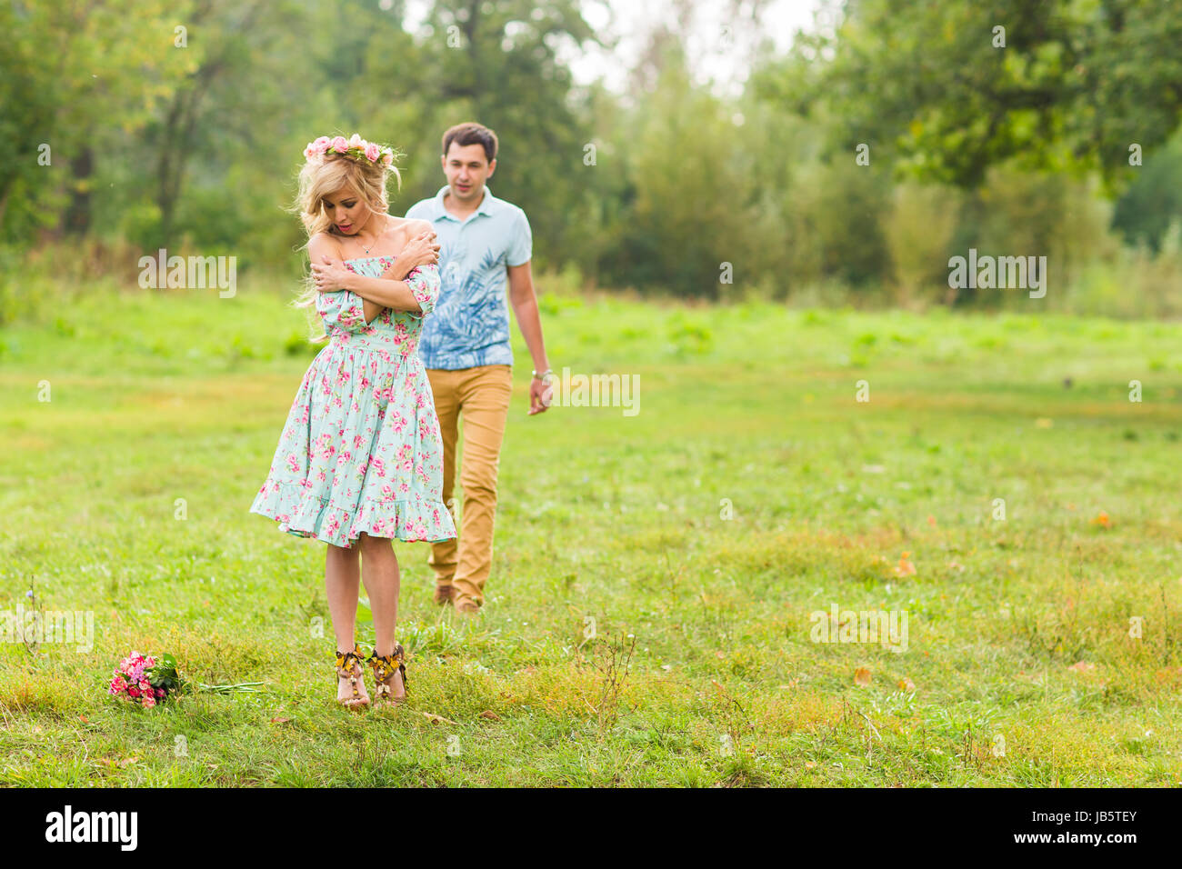 Young couple in love hug each other in nature Stock Photo - Alamy