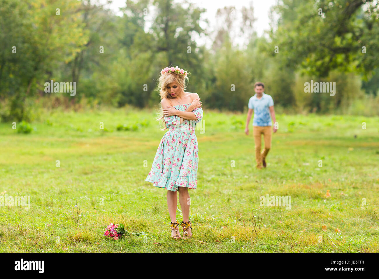 Young couple in love hug each other in nature Stock Photo - Alamy