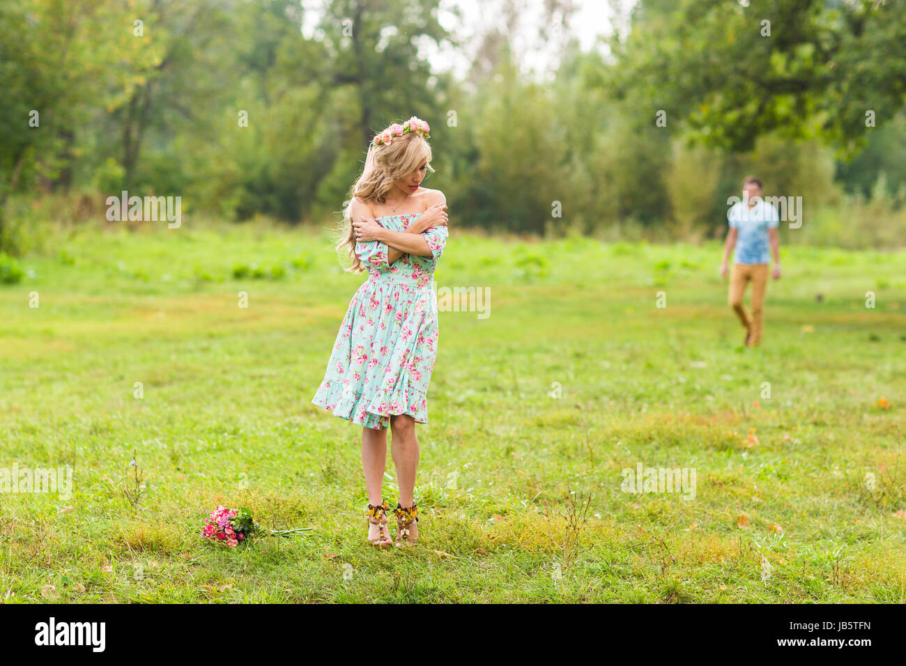 Young couple in love hug each other in nature Stock Photo - Alamy