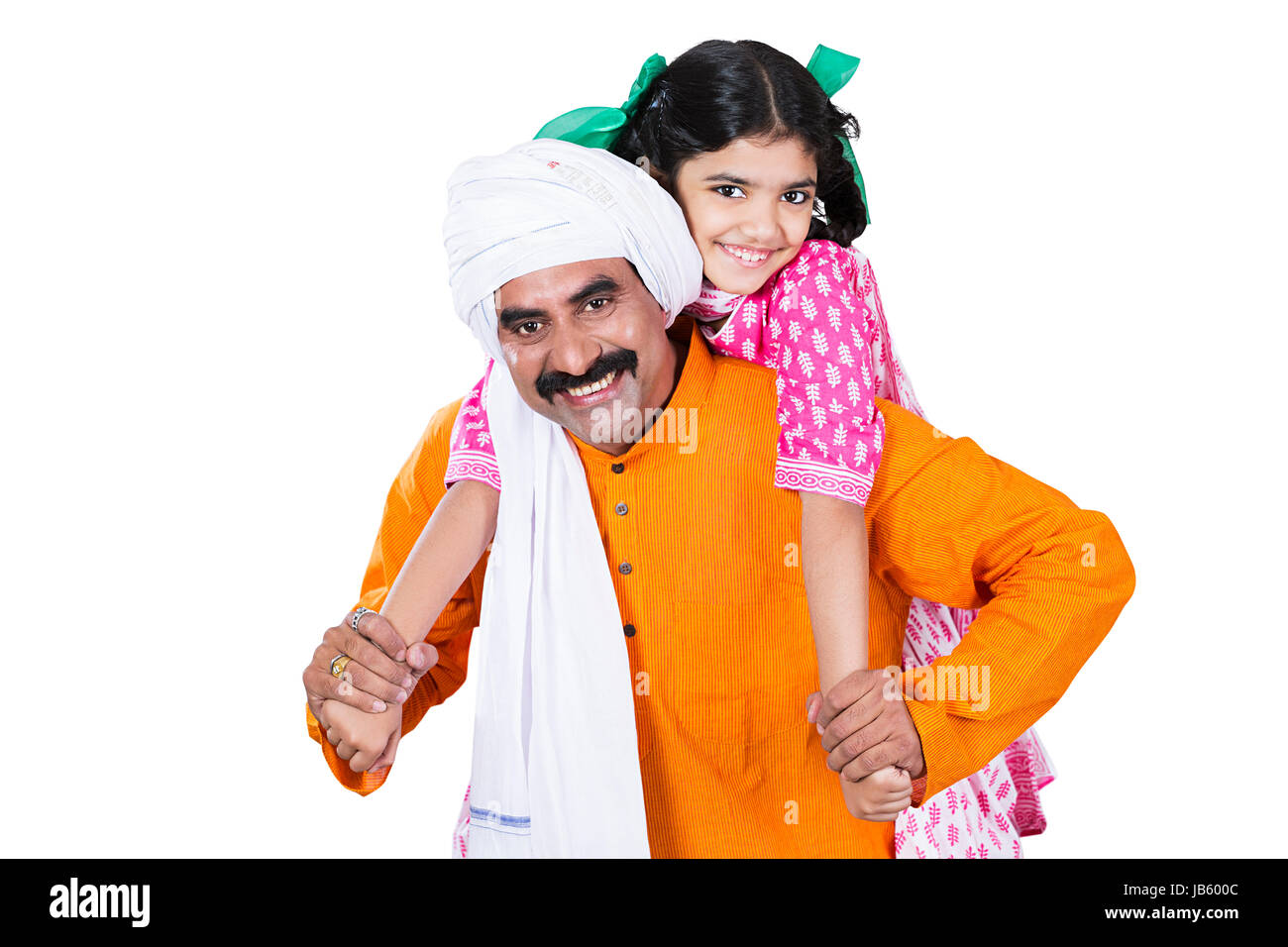 Indian Rural Farmer Father giving her daughter a piggy back ride On White Background Stock Photo