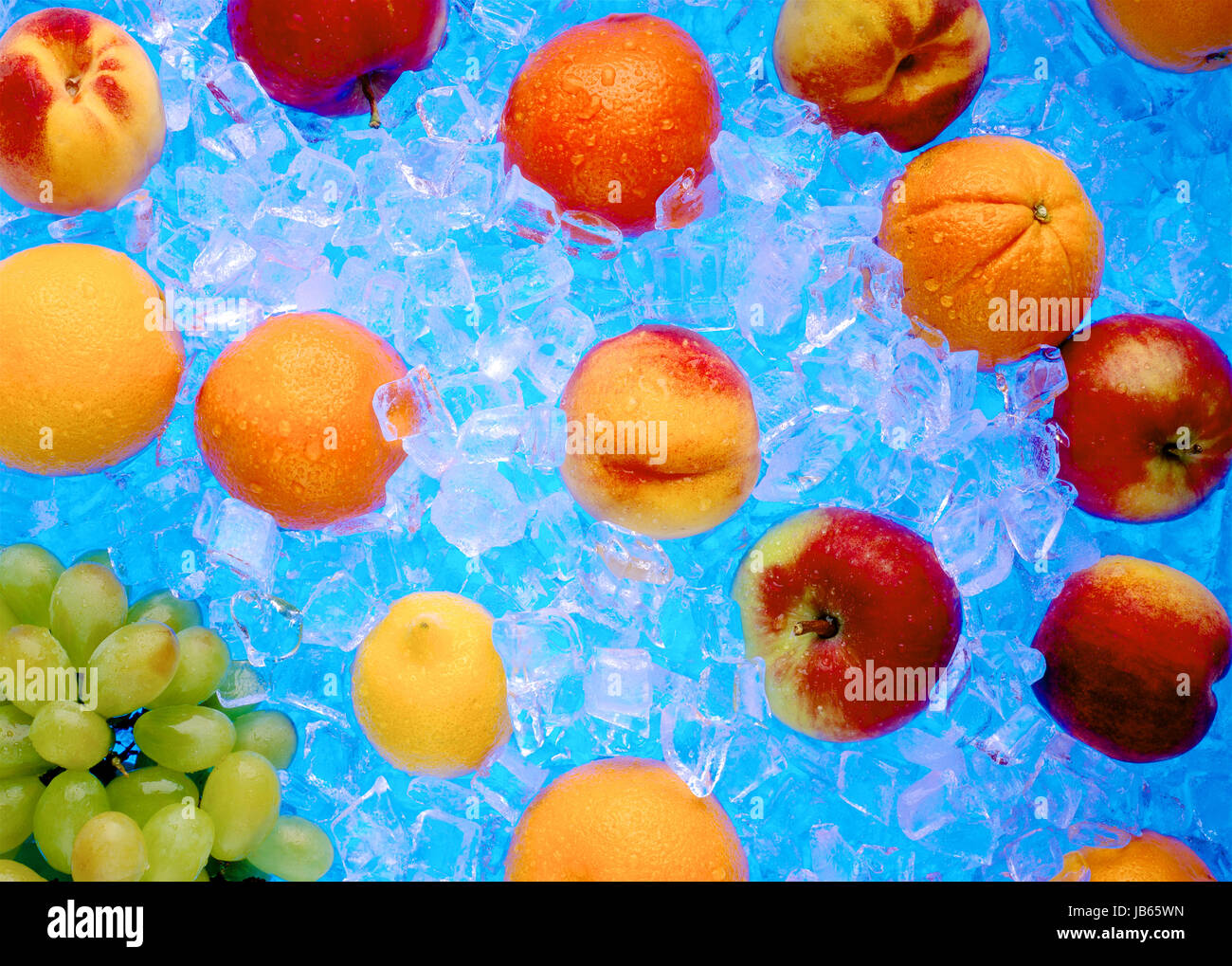 fresh frozen fruit in ice Stock Photo Alamy