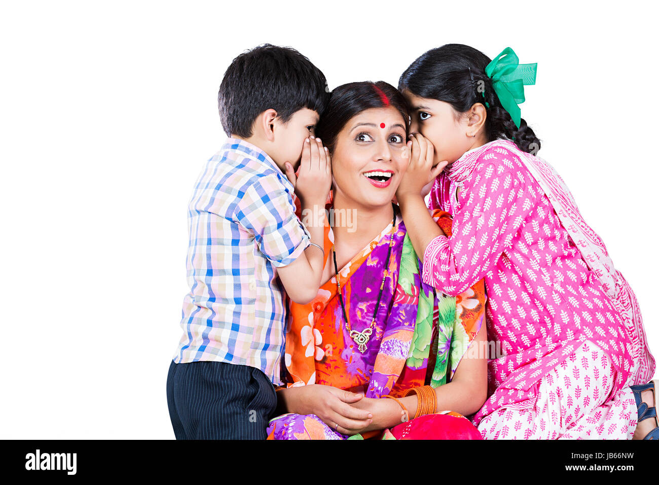 Happy Indian Rural 2 Children Whispering Mother In The Ear Secret s Stock Photo