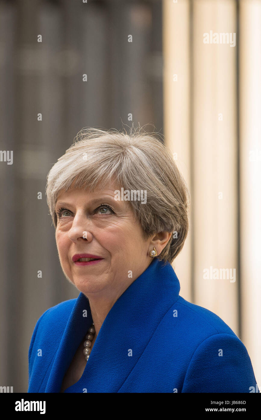 Prime Minister Theresa May makes a statement in Downing Street after she traveled to Buckingham Palace for an audience with Queen Elizabeth II following the General Election results. Stock Photo