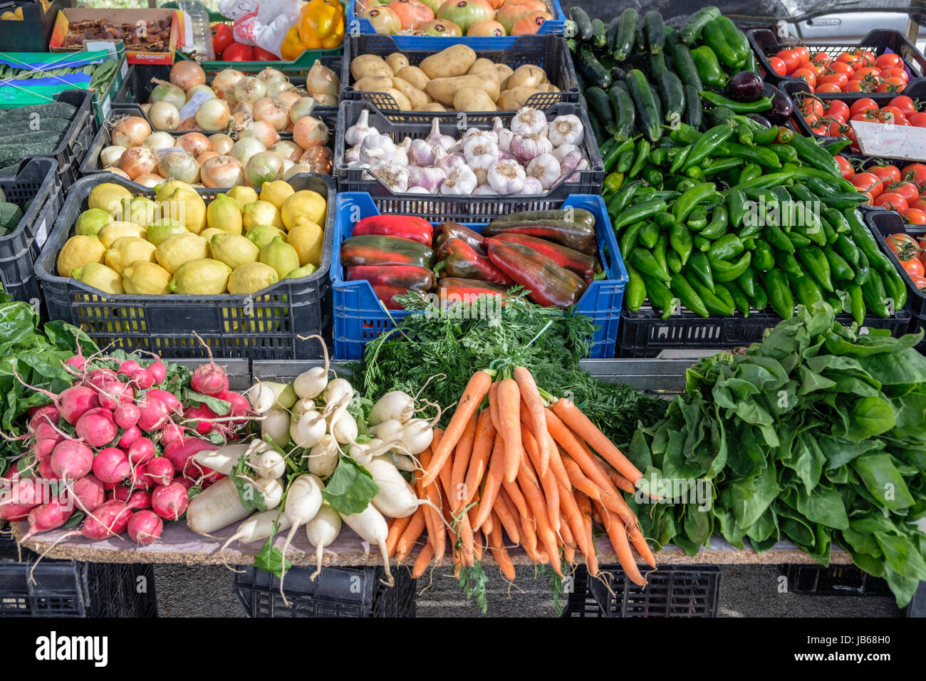 Fresh organic vegetables on a market stall. Stock Photo