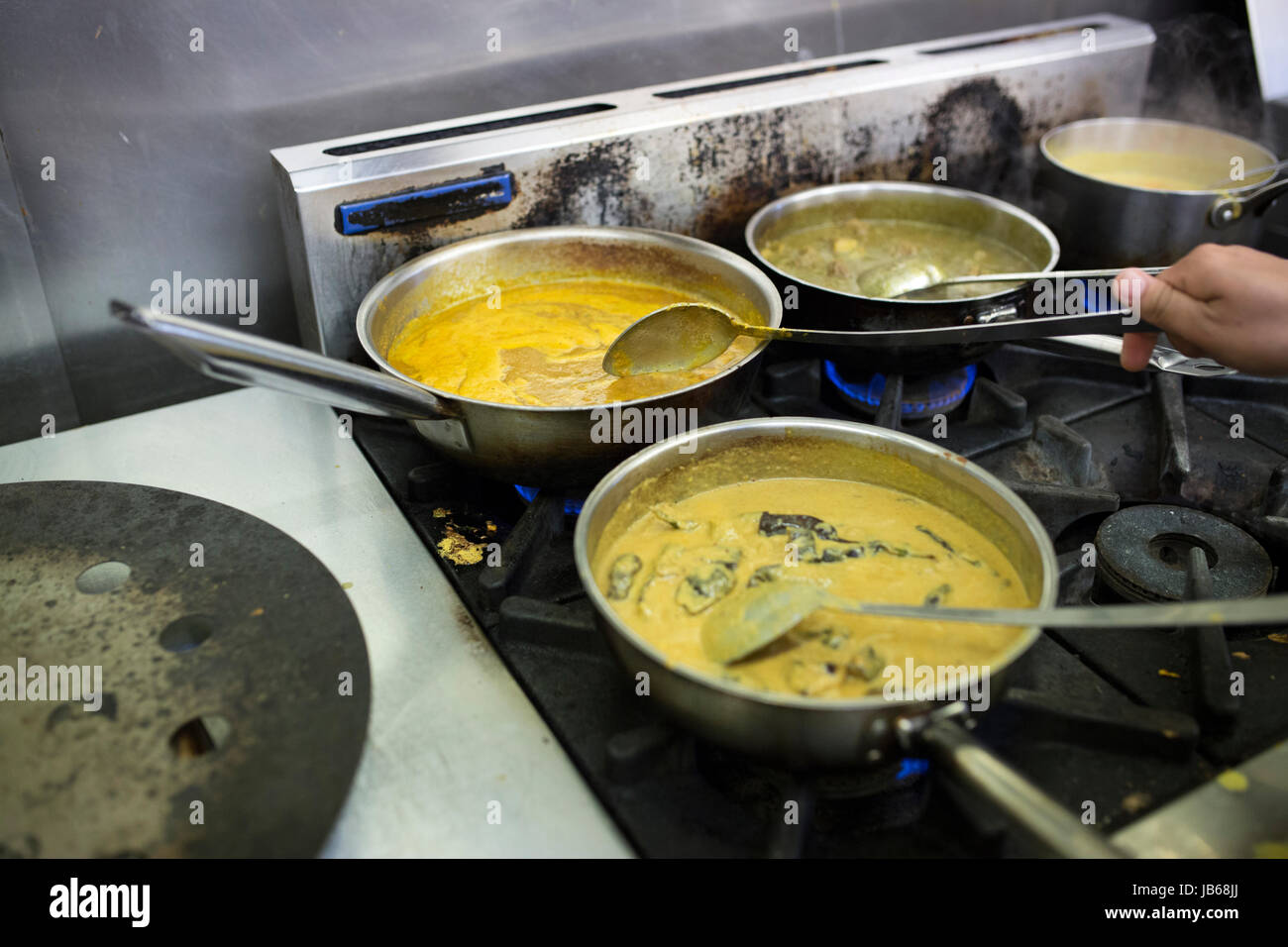 Indian cooking pans hi-res stock photography and images - Alamy