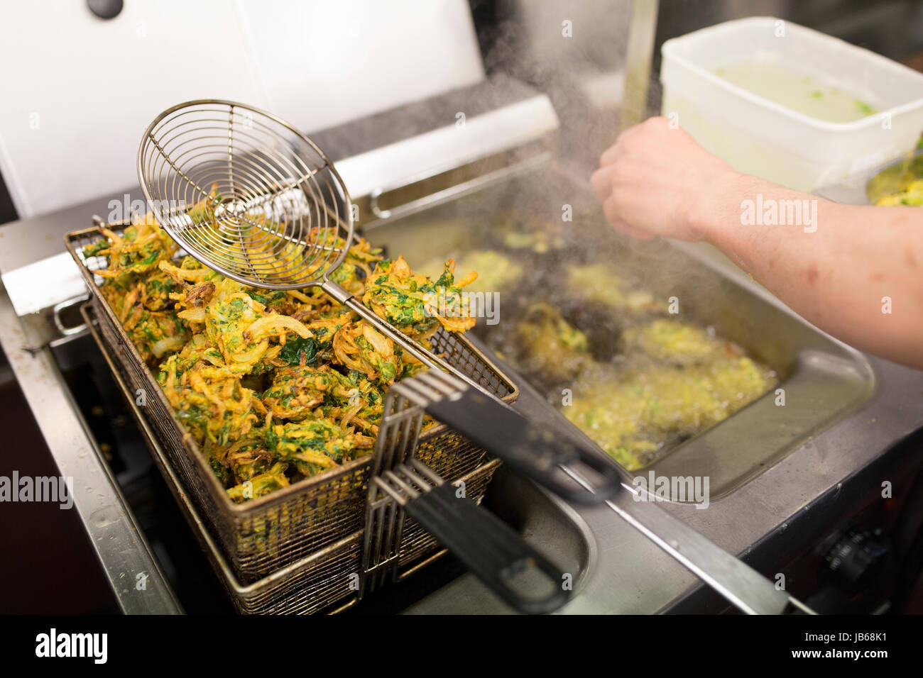 cooking in Indian restaurant Stock Photo