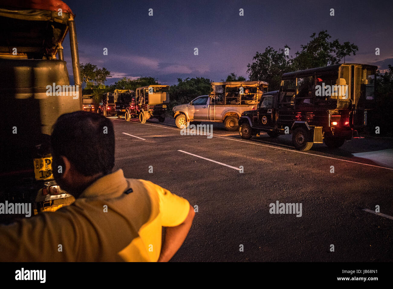 Jeeps waiting for the Yala National Park to open in the morning - Sri Lanka Stock Photo