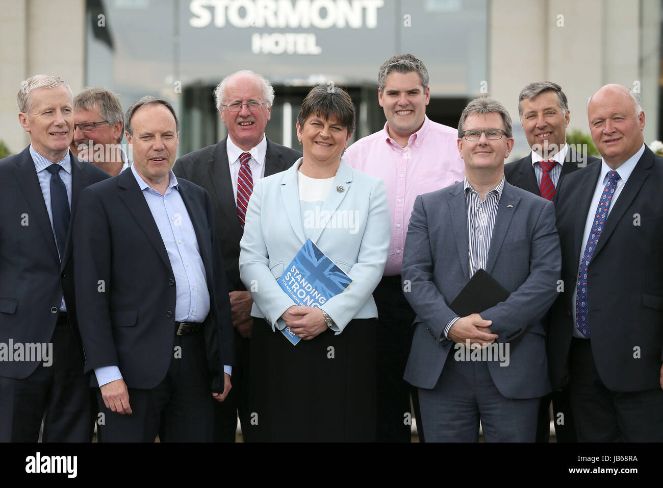 DUP leader Arlene Foster (centre) with MP's at the Stormont Hotel in Belfast after Prime Minister Theresa May has announced that she will work with 'friends and allies' in the DUP to enable her to lead a government. Stock Photo