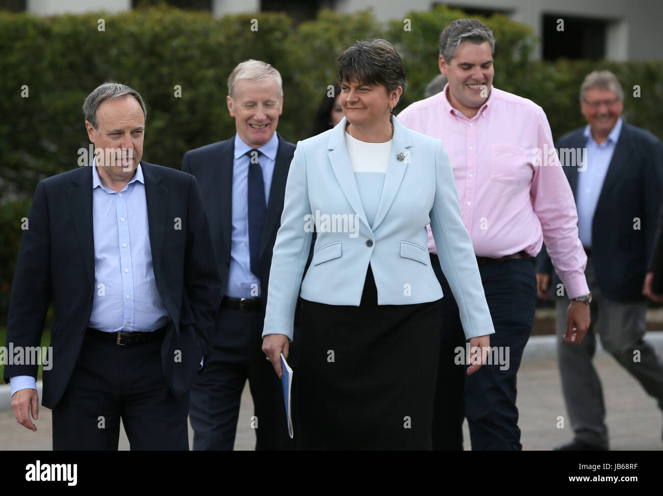 DUP leader Arlene Foster (centre) with MP's at the Stormont Hotel in Belfast after Prime Minister Theresa May has announced that she will work with friends and allies in the DUP to enable her to lead a government. Stock Photo