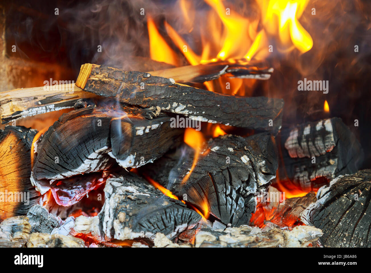 Burning fireplace. Fireplace as a piece of furniture Stock Photo Alamy