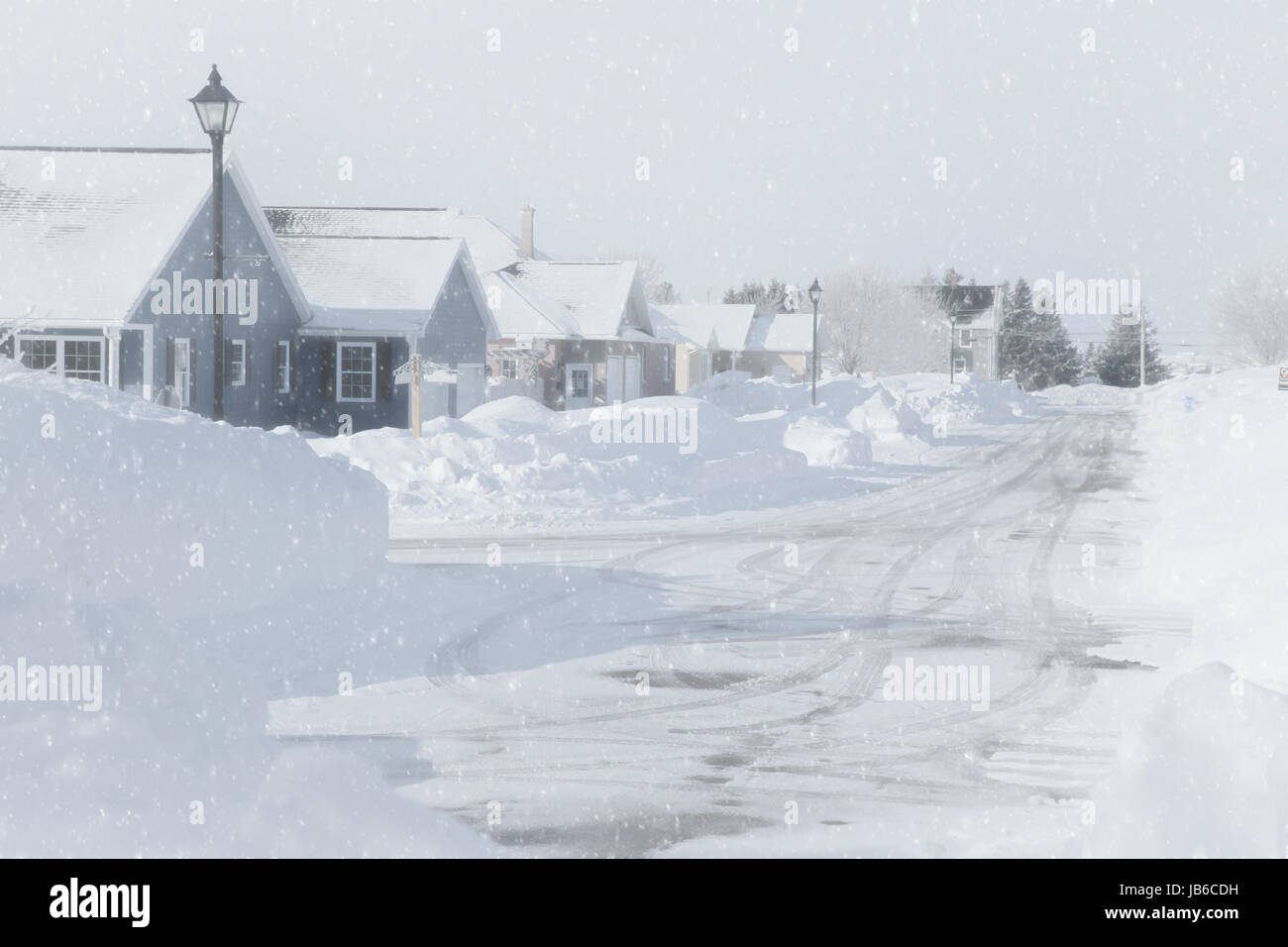 Snow falling in a North American neighborhood. Stock Photo