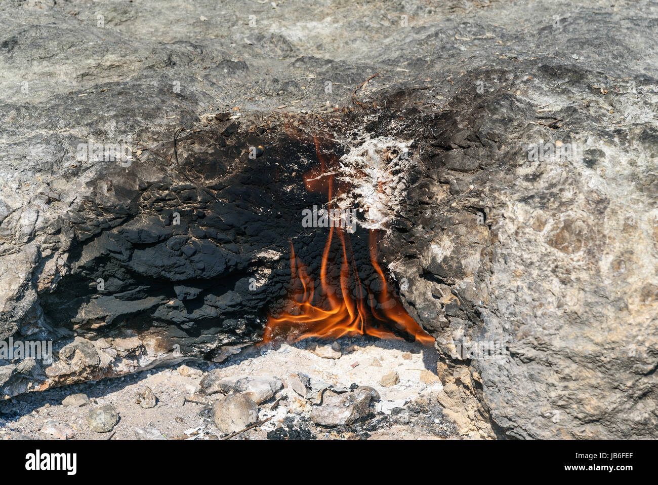 Flames of Chimaera Mount from the ground. Fire from natural gas in the rocks. Turkey Stock Photo