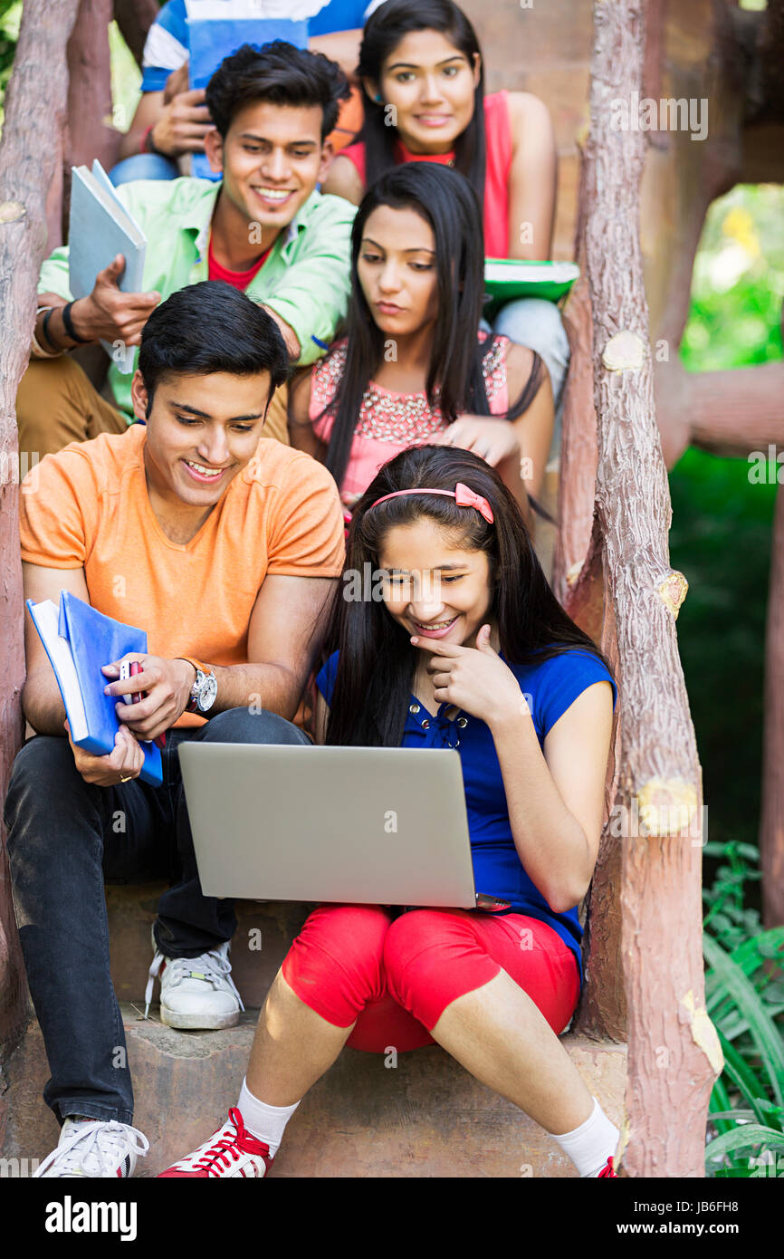 Indian Group College Girls And Boys Student Friends Using Laptop Stock