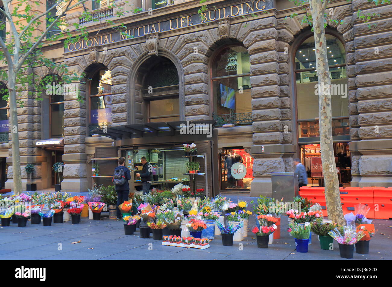 People visit flower shop in Martin Place downtown Sydney Australia. Stock Photo