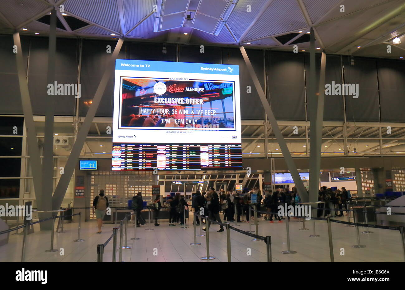 People travel at Sydney domestic airport in Sydney Australia. Stock Photo