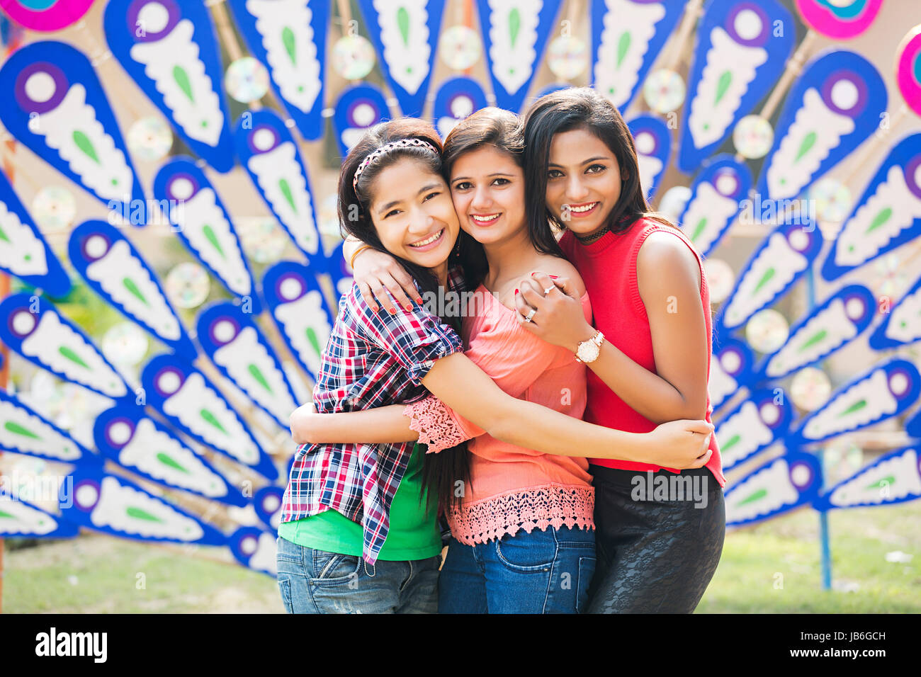 Happy 3 Young Girls Standing Hugging Together In Mela Surajkund Stock Photo  - Alamy