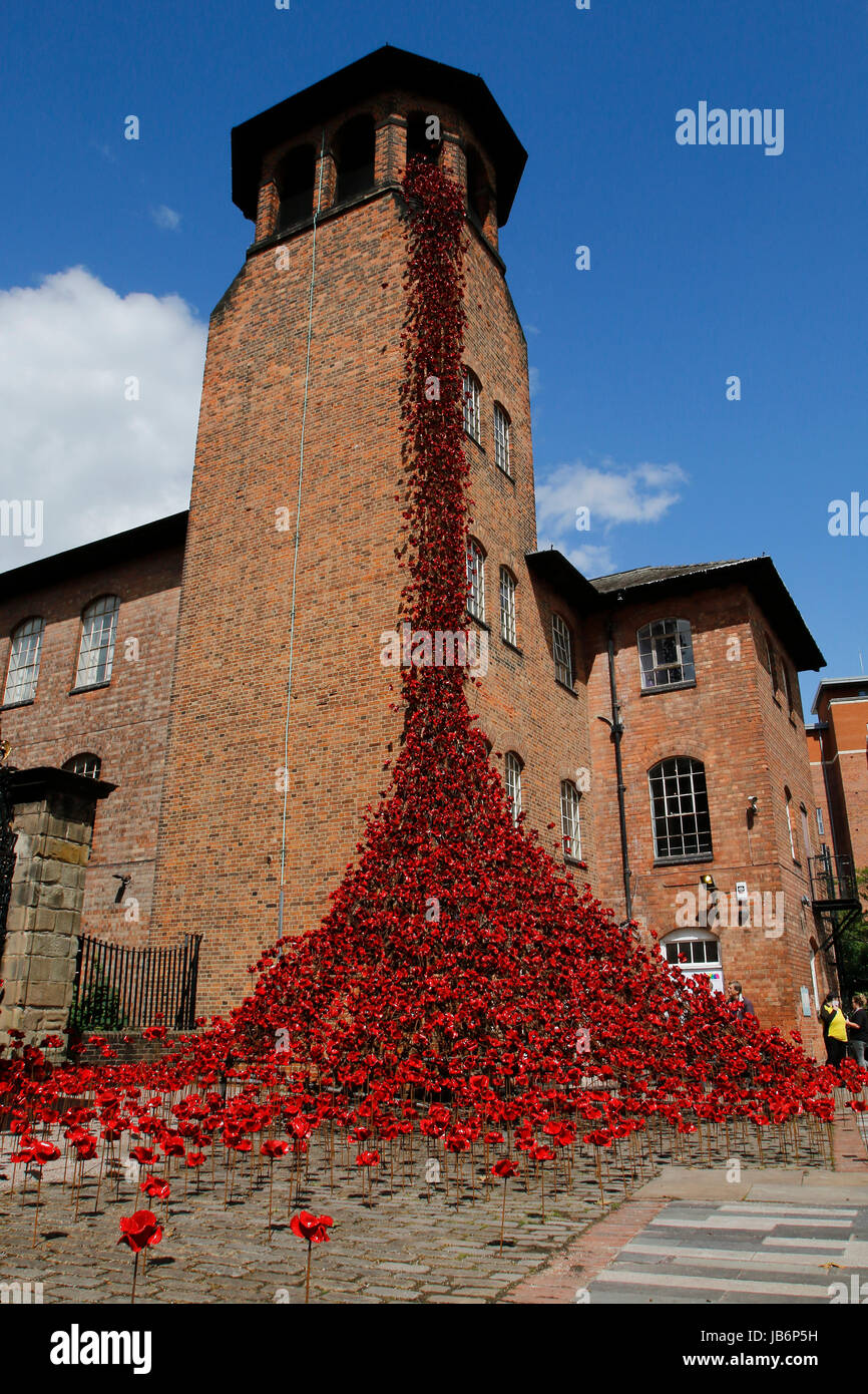 London, UK. 9th Jun, 2017. First full public display of the Weeping Window poppy display at Derby Silk Mill Tower. The display is made up of several thousand of the ceramic flowers created by Derbyshire's Paul Cummins and formed part of the magnificent Blood Swept Lands and Seas of Red exhibition at the Tower of London in 2014. Derby, UK. 9th June 2017. Credit: Richard Holmes/Alamy Live News Stock Photo