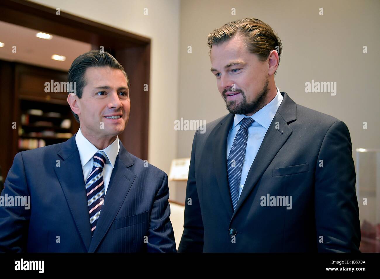 Mexico City, Mexico. 09th June, 2017. Mexican President Enrique Pena Nieto, left, and actor Leonardo DiCaprio discuss the critically endangered Vaquita, a porpoise native to Mexico's Gulf of California, at the presidential palace Los Pinos June 8, 2017 in Mexico City, Mexico. DiCaprio is joining forces with Pena Nieto and Mexican billionaire Carlos Slim to try and save the Vaquita from extinction. (photo by Presidenciamx via Planetpix) Stock Photo