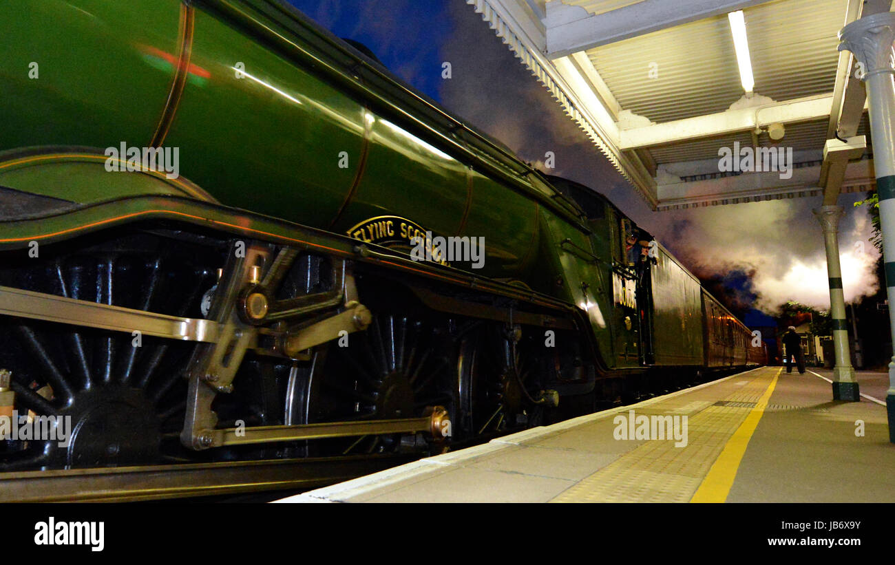 Reigate, UK. 09th June, 2017. Flying Scotsman 60103 Steam Locomotive hauling pullman coaches speeds through Reigate Station in Surrey. 2201hrs Friday 9th June 2017. Photo Credit: Lindsay Constable/Alamy Live News Stock Photo