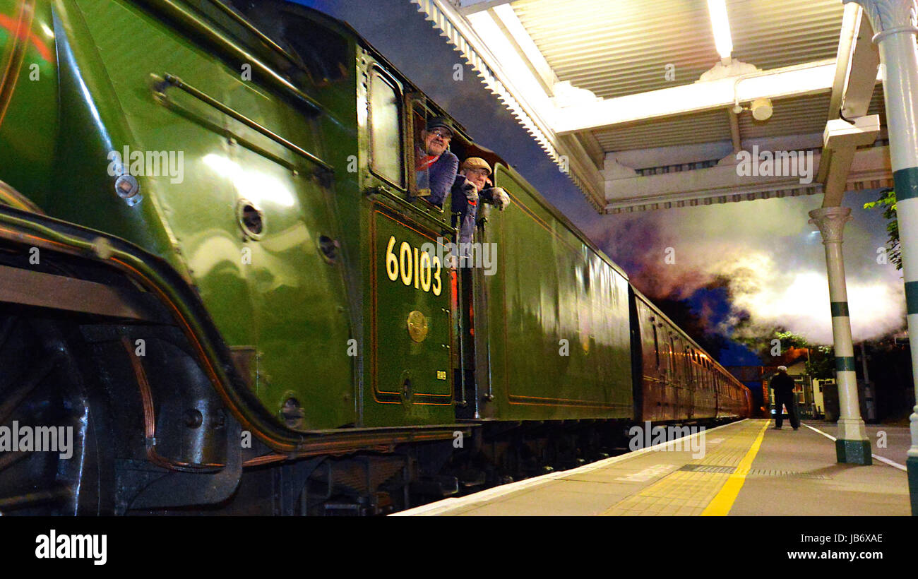 Reigate, UK. 09th June, 2017. Flying Scotsman 60103 Steam Locomotive hauling pullman coaches speeds through Reigate Station in Surrey. 2201hrs Friday 9th June 2017. Photo Credit: Lindsay Constable/Alamy Live News Stock Photo