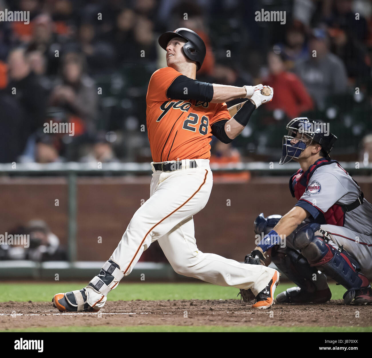 San Francisco, California, USA. 09th June, 2017. San Francisco Giants catcher Buster Posey (28) watches a high fly during the bottom of the seventh inning of a MLB baseball game between the Minnesota Twins and the San Francisco Giants on Portuguese Heritage Night at AT&T Park in San Francisco, California. Valerie Shoaps/CSM/Alamy Live News Stock Photo