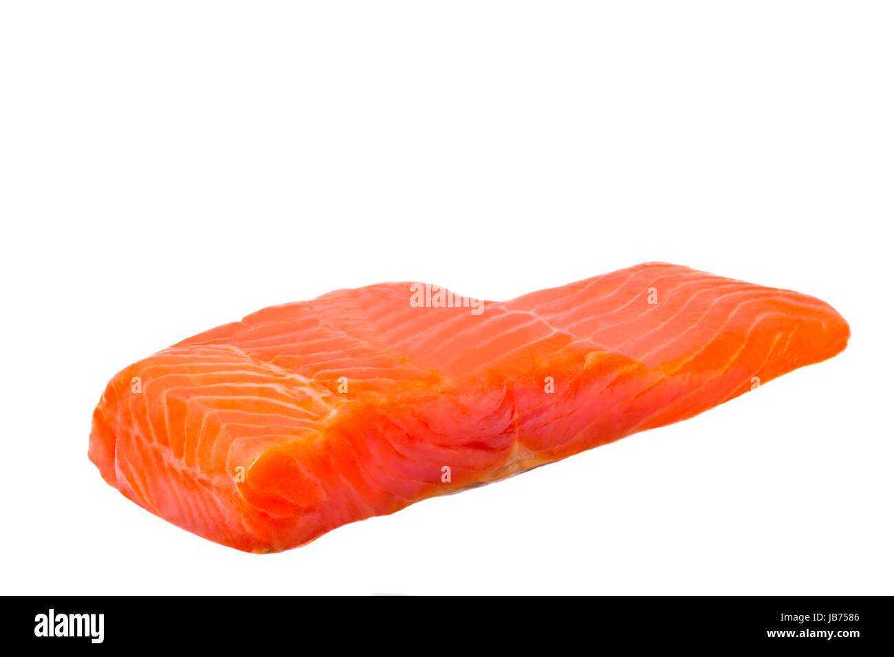 A piece of fillet of trout. Photographed close-up on a white background. Stock Photo