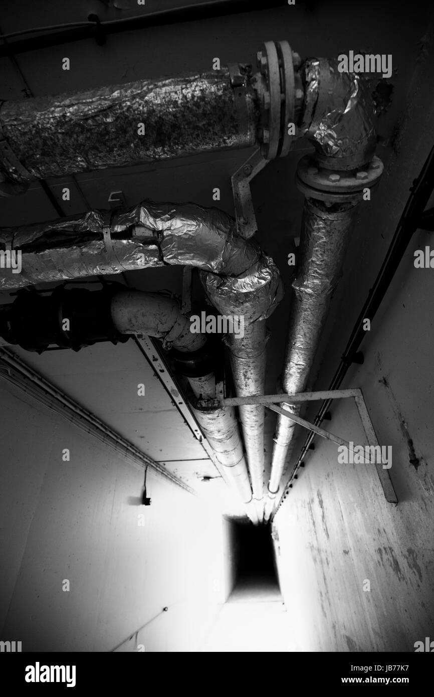 Corridor and pipework at RAF Neatishead underground bunker. Stock Photo