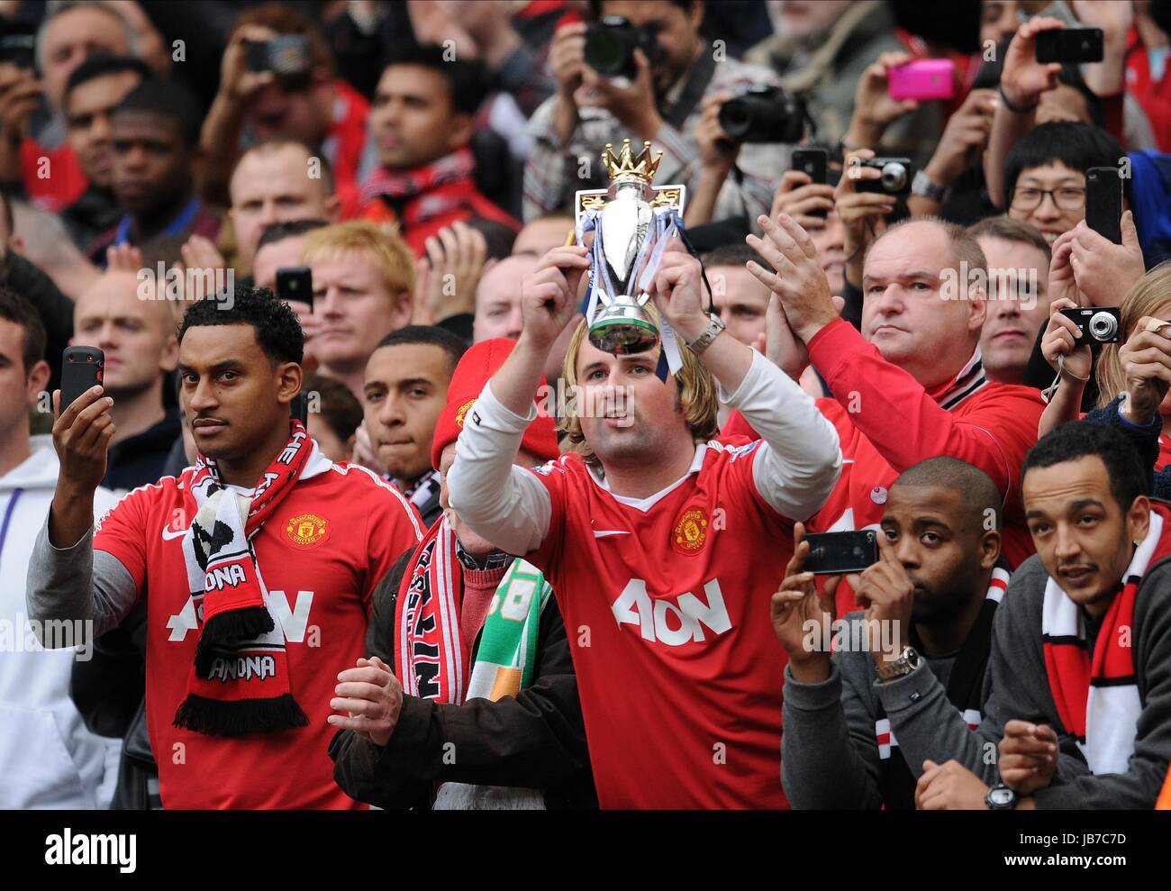 FANS WITH CAMERA'S TROPHY MANCHESTER CITY FC MANCHESTER CITY FC MANAGER