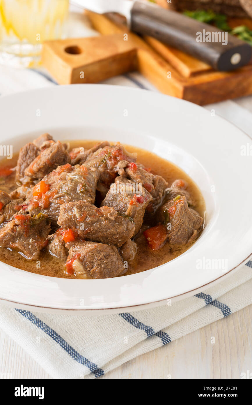 Beef goulash, stew of meat, and vegetables, seasoned with paprika and