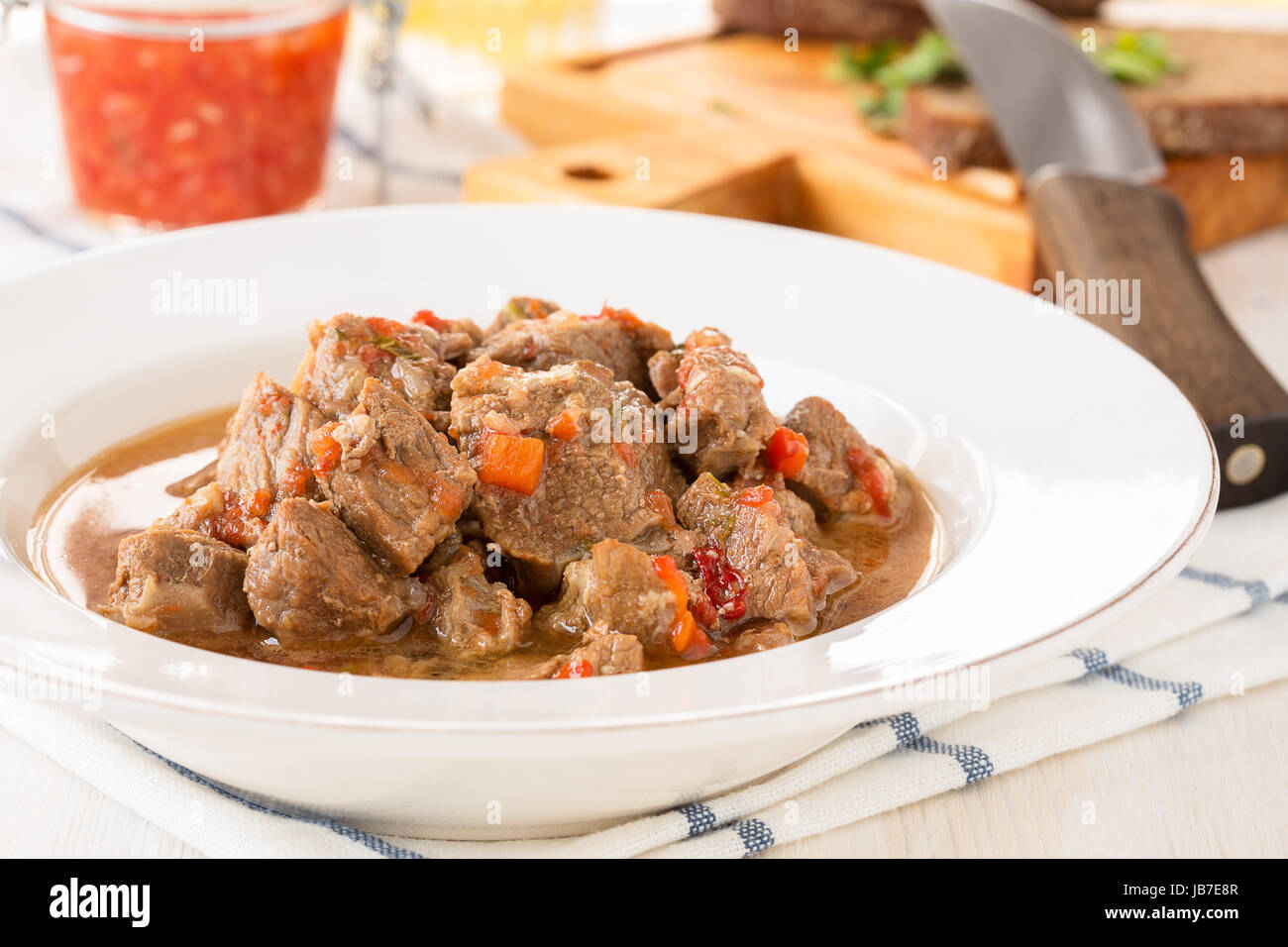 Beef goulash, stew of meat, and vegetables, seasoned with paprika and