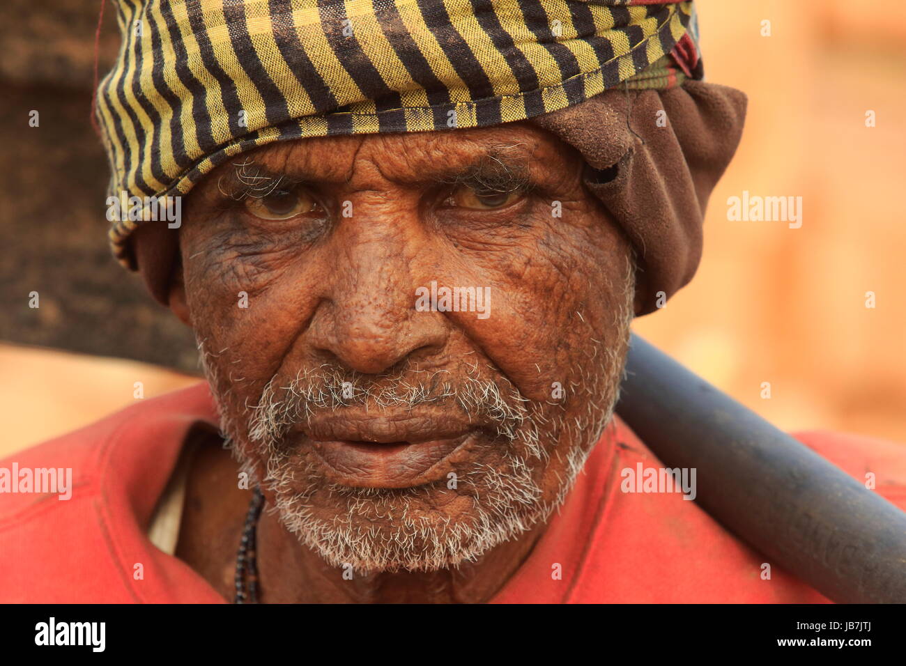 Old man working hard hi-res stock photography and images - Alamy
