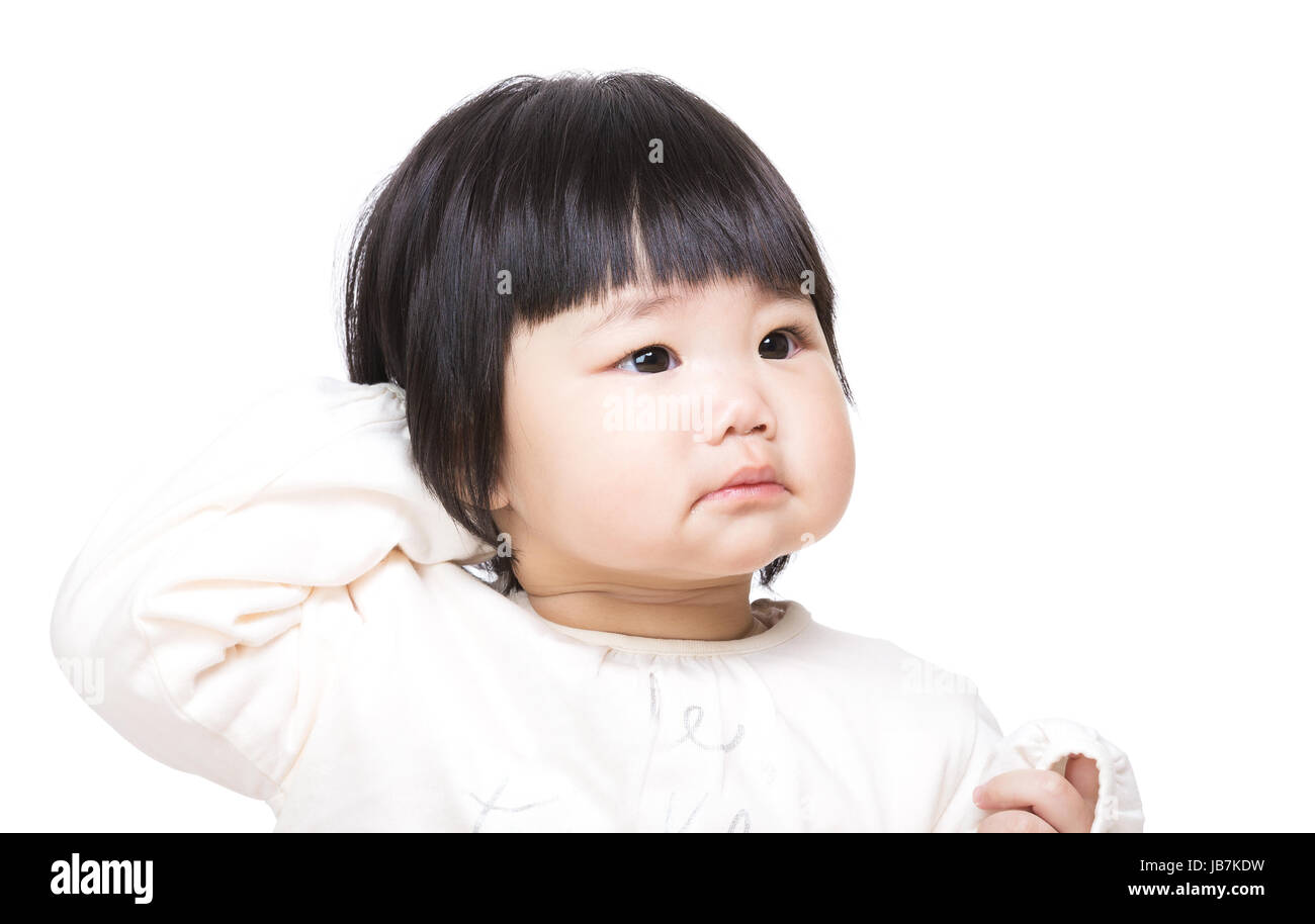 Surprised baby scratching head Stock Photo Alamy