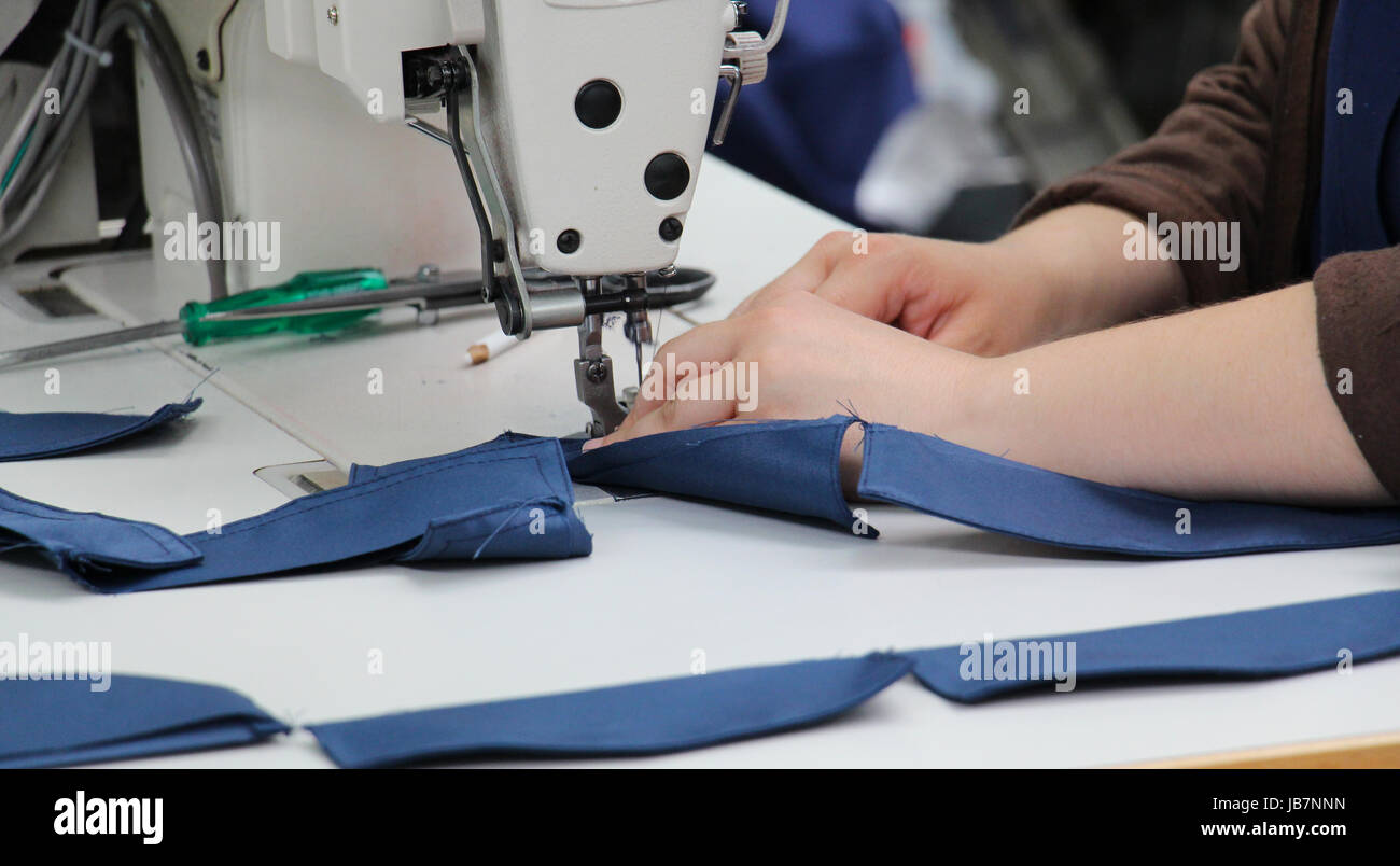 picture of a Female worker on textile production industry Stock Photo ...