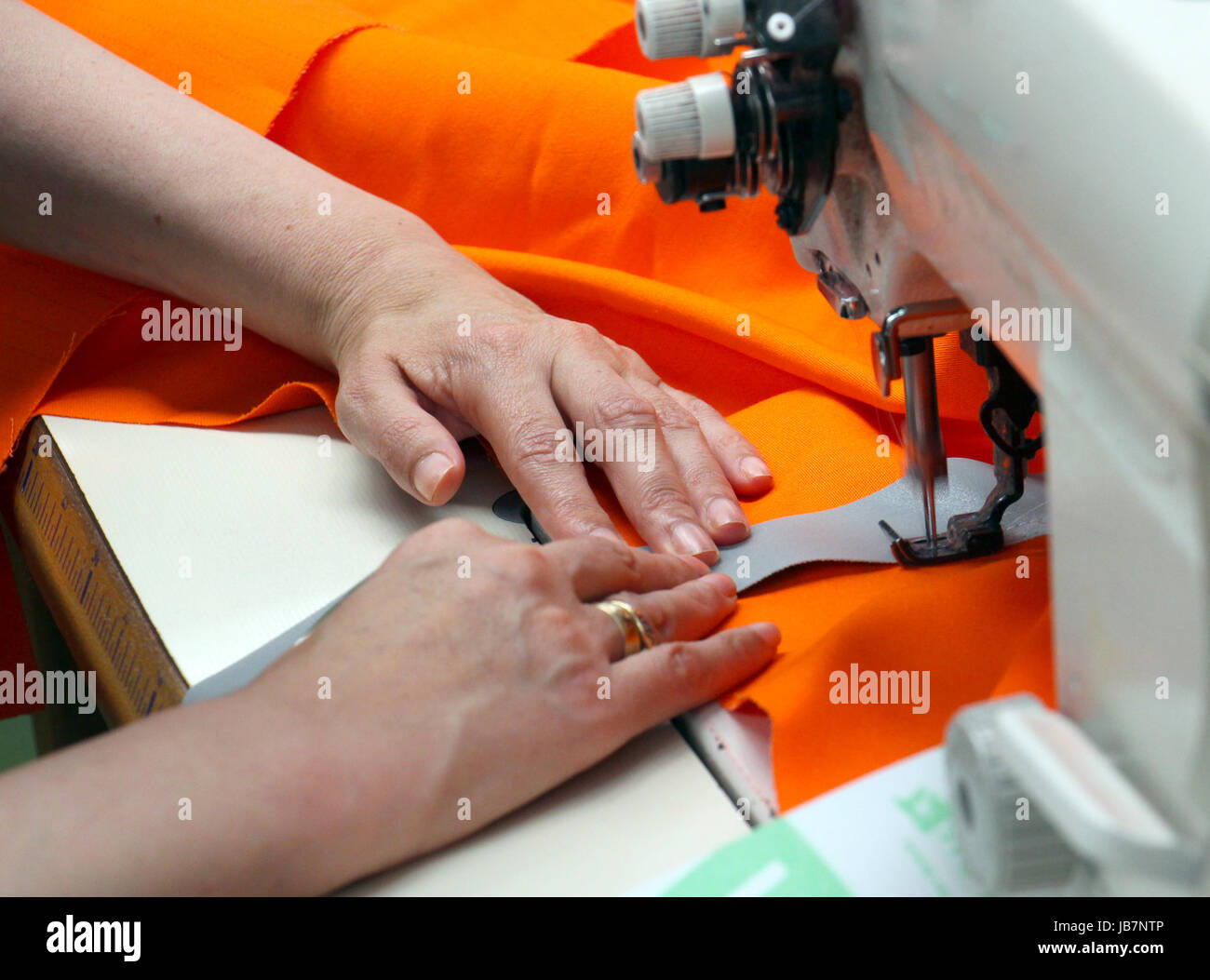 picture of a Female worker on textile production industry Stock Photo ...