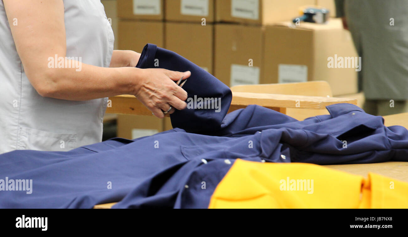 picture of a Female worker on textile production industry Stock Photo ...