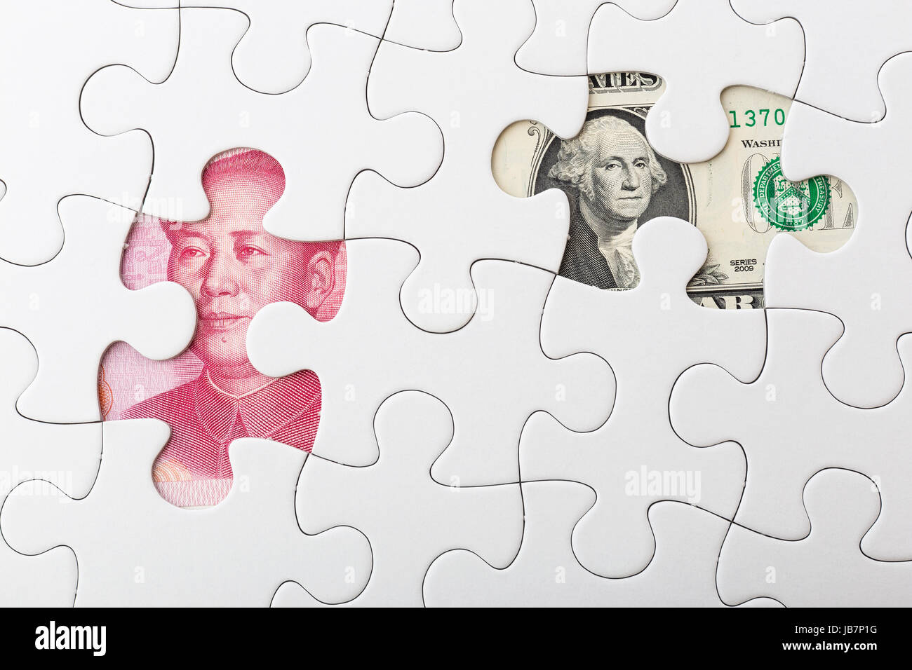 US and chinese yuan with white puzzle for exchange rate concept Stock Photo
