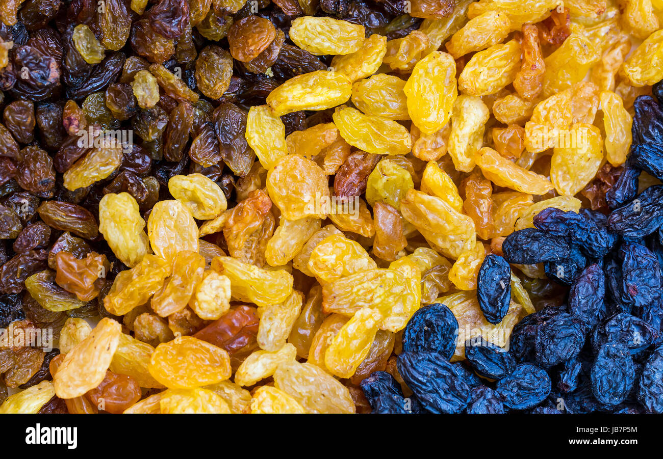 Cyan Dried Rasin Background dried raisin grapes close up shot Stock Photo - Alamy