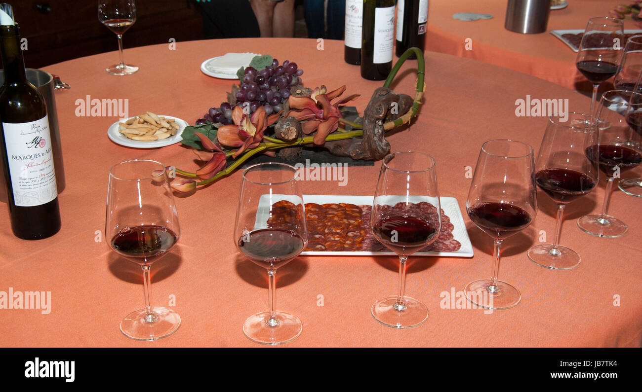 Serving red wine in glasses Stock Photo Alamy