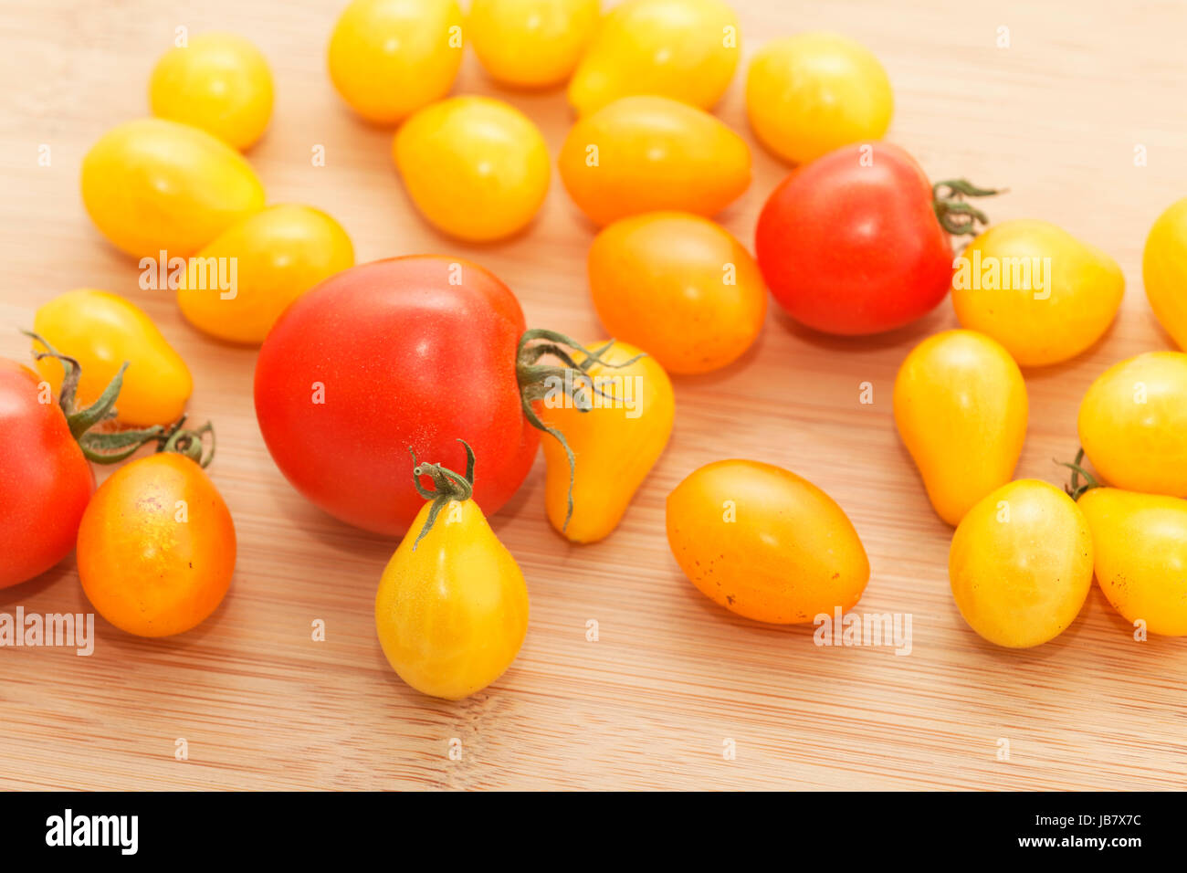 tomatoes duck on wooden base Stock Photo