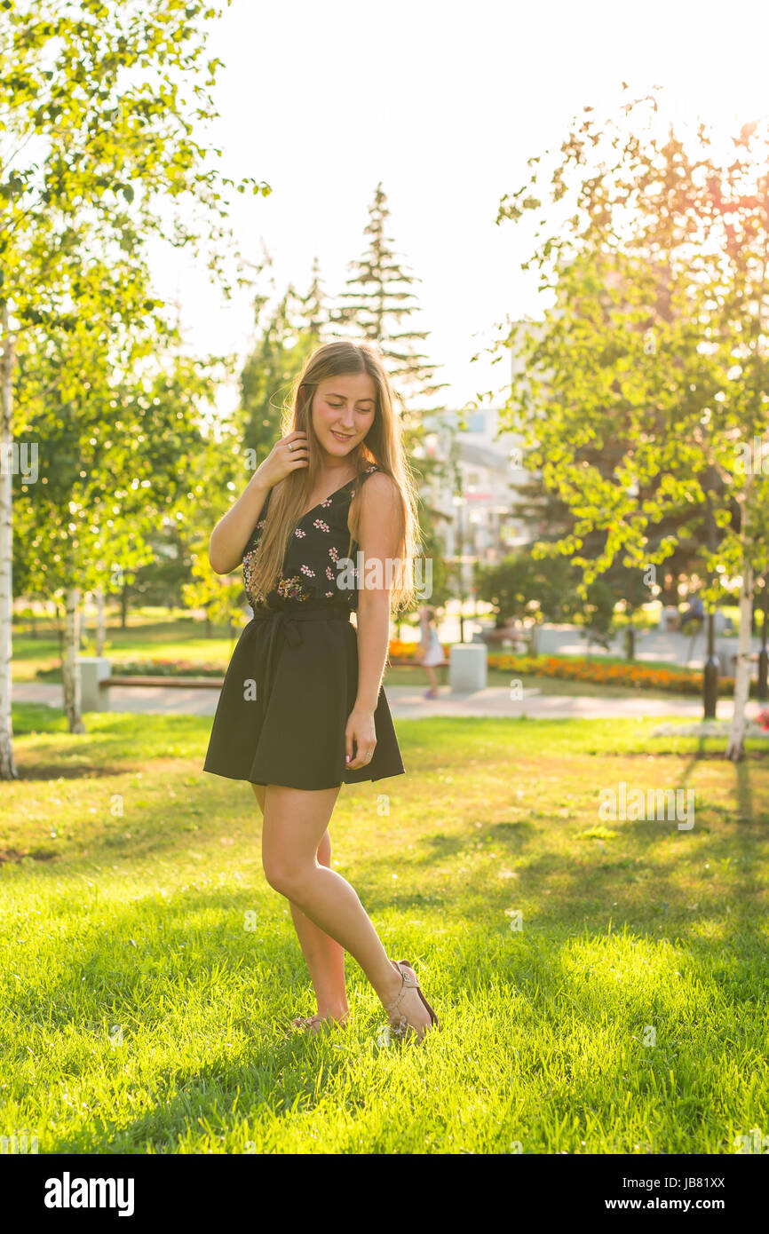 Beautiful young woman in the park. Outdoor portrait Stock Photo - Alamy
