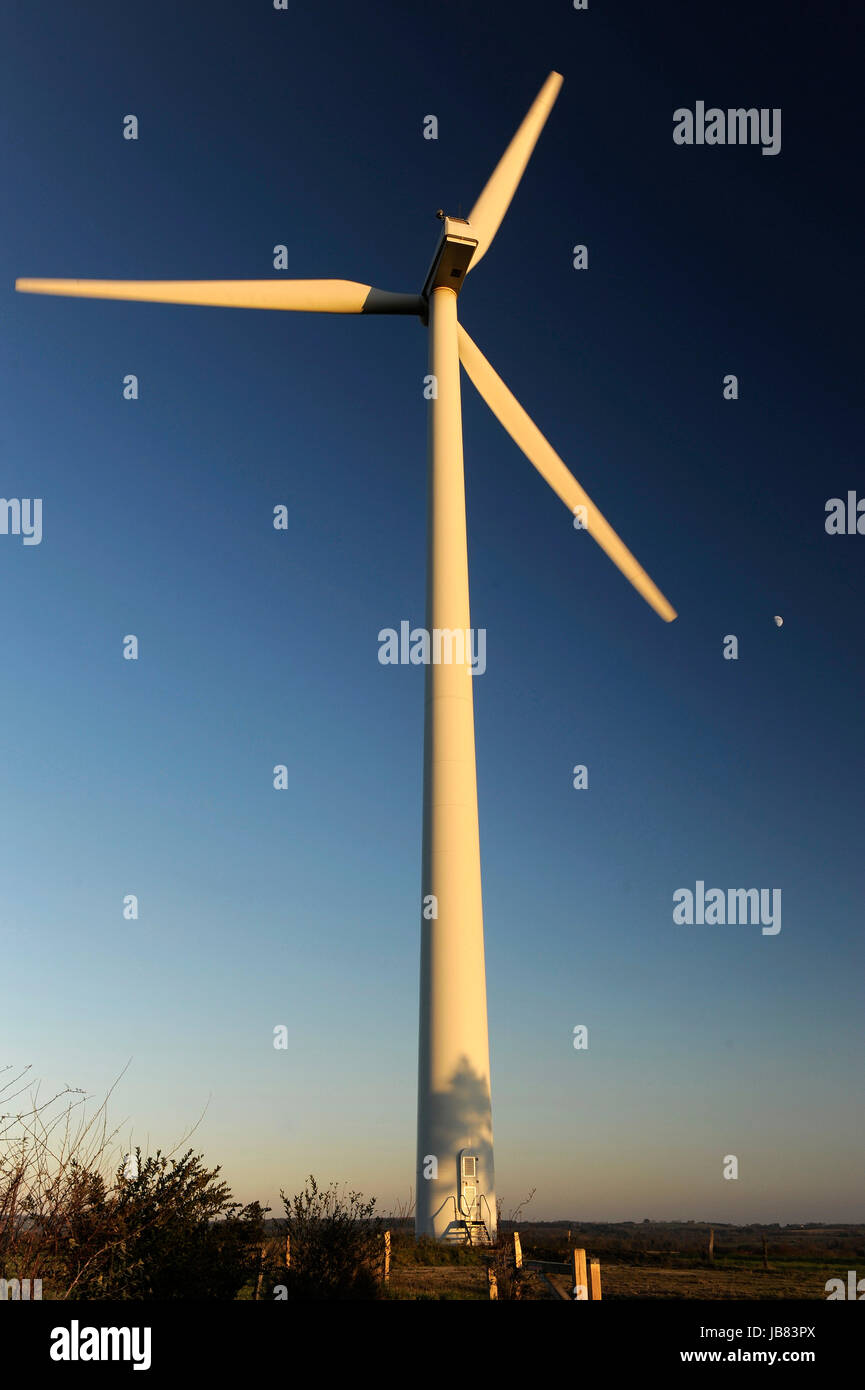 Wind turbine set against a clear blue winter sky Stock Photo - Alamy