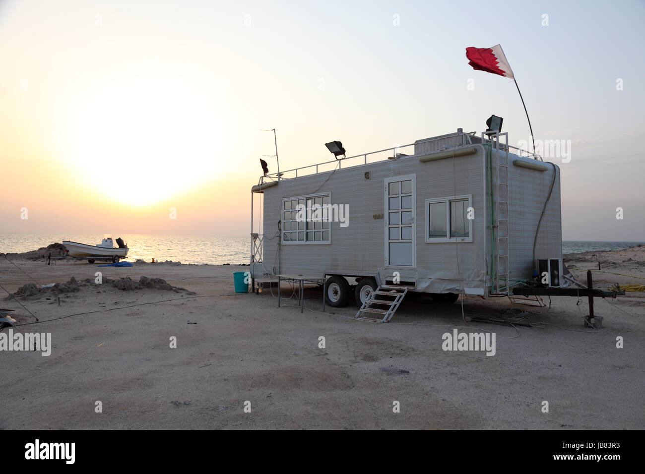 Trailer and boat on the Arabian Gulf beach in Qatar Stock Photo Alamy
