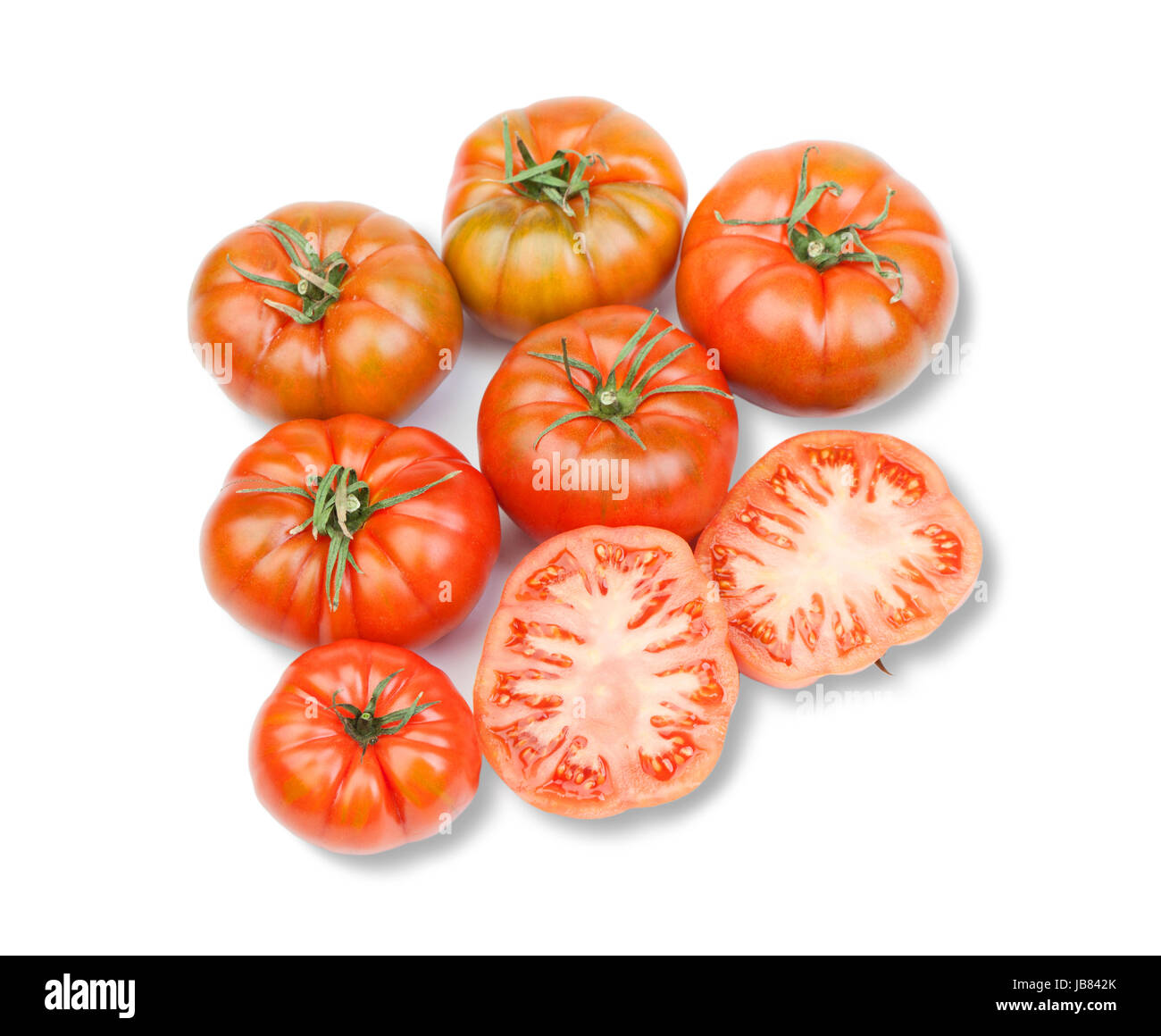 Delicious red tomatoes isolated on white background Stock Photo - Alamy