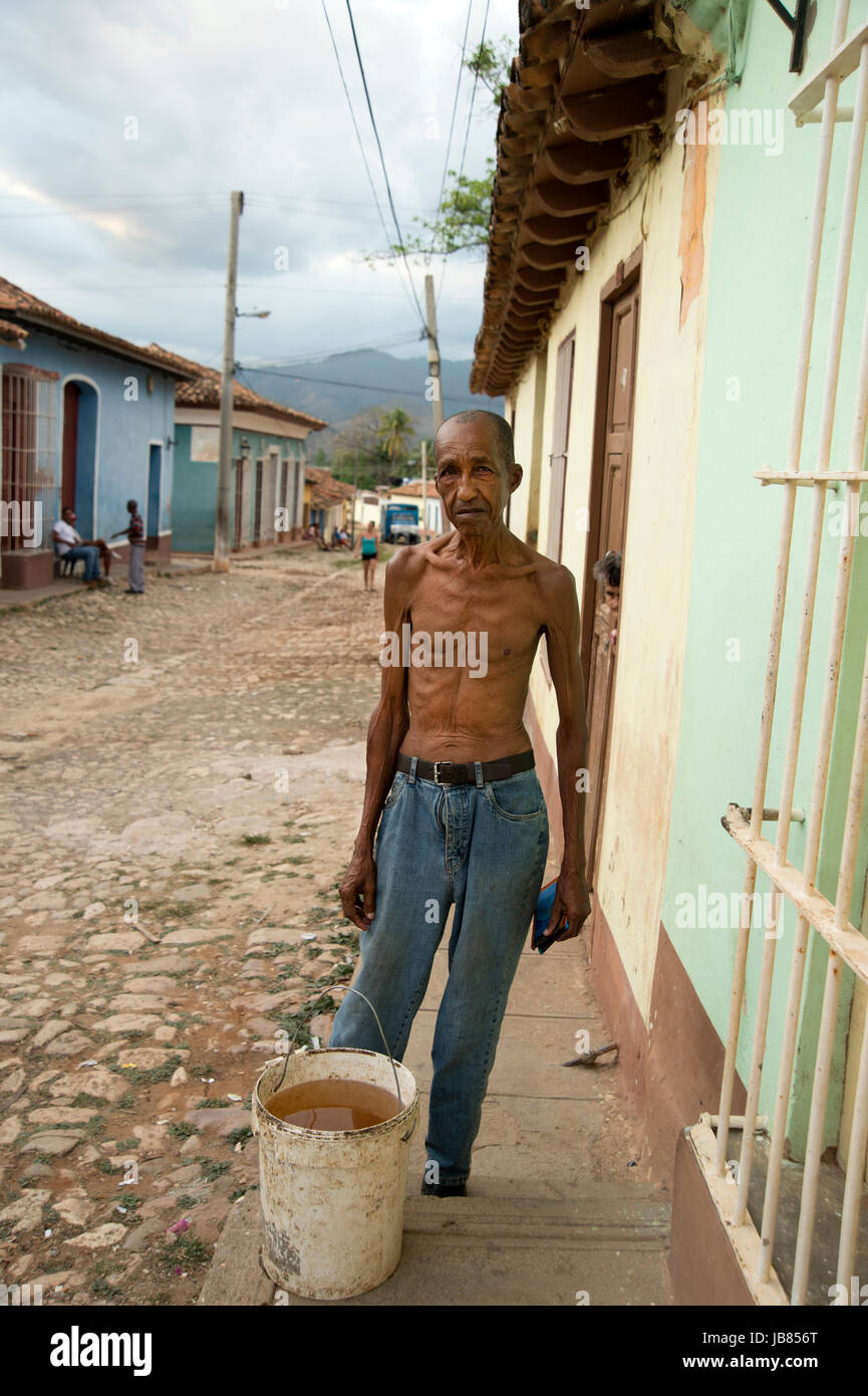 Portrait Of An Old Very Thin Man Outside His House In Trinidad Cuba Stock Photo Alamy